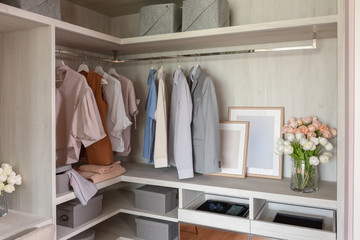 wooden wardrobe with set of clothes