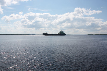 silhouette of  ship against  blue cloudy sky