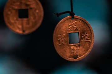 Oriental, magical pendants. Traditional asiatic and chinese currency, transformed into fortune...