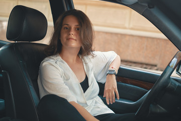 Portrait confident woman driver