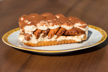 Traditional italian dessert tiramisu on a table