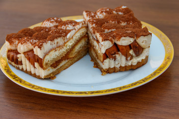 Traditional italian dessert tiramisu on a table
