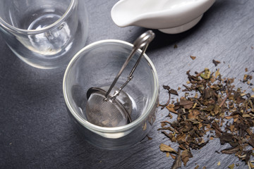 Double walled glass with tea and stainless steel tea infuser