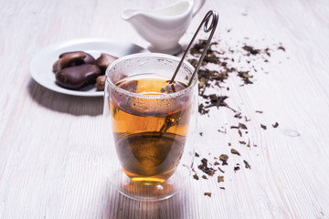 Double walled glass with tea and stainless steel tea infuser