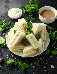 Cucumber sandwiches with soft cheese, sea salt and water cress for tea party