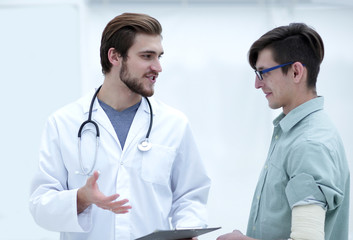 Fototapeta premium doctor gives advice to his patient