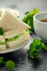 Cucumber sandwiches with soft cheese, sea salt and water cress for tea party