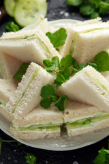 Cucumber sandwiches with soft cheese, sea salt and water cress for tea party