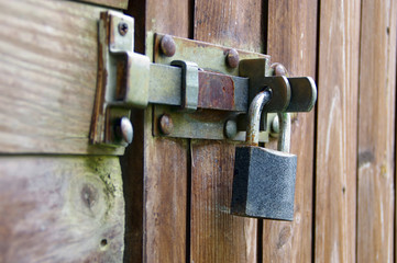 Old padlock on door