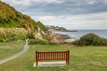 A bench with a view over the seaside town of Ventnor, on the Isle of Wight