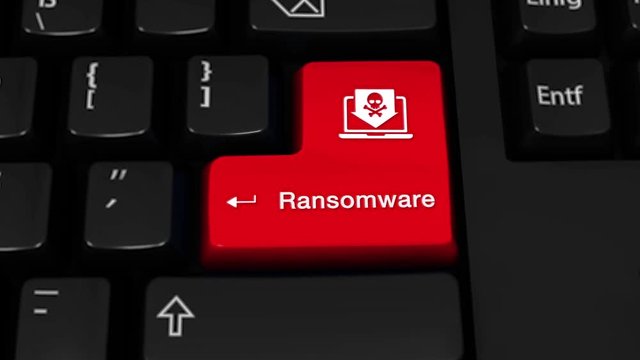 02. Ransomware Rotation Motion On Red Enter Button On Modern Computer Keyboard with Text and icon Labeled. Selected Focus Key is Pressing Animation. Computer Hacking Concept