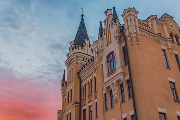 Beautiful building in classical style with towers on sunset background. Kiev, Ukraine