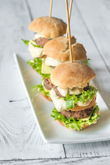 Burgers on the white plate