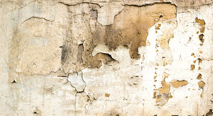 Texture of the old wall of the house. A frayed background.