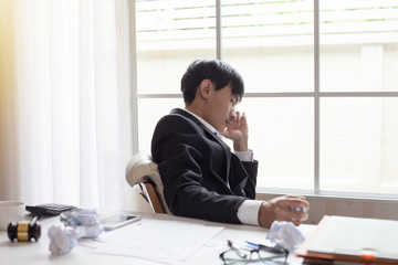 Fototapeta premium Businessman feeling sick and tired. Businessman who feel stressed out of work