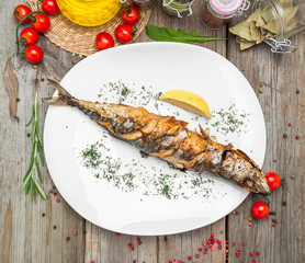 Oktoberfest menu. Grilled mackerel fish with beer and pretzel served