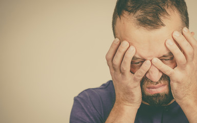 Worried man gesturing with hands