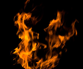 bright fire on a black background at night