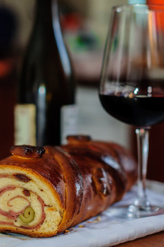 Delicious fresh pastry bread stuffed with baicon ham, freshly baked olives