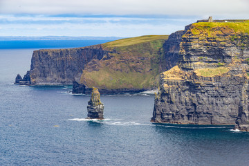 Caslte tower and rocks in Cliffs of Moher