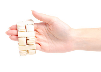 Bijouterie bracelet ivory stone in hand on white background isolation