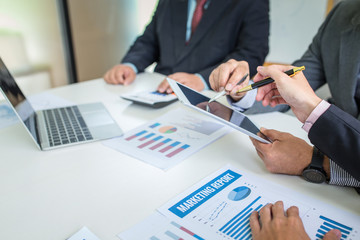 Group of business people discuss the financial investment at meeting.