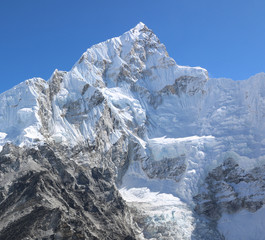 Amazing and wonderful Shot of Nepalese Himalayas mountain peaks covered with white snow attract many climbers, some of them highly experienced 