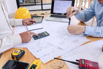 Engineers plan to complete construction create together in the meeting.