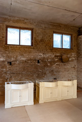 Bathroom vanity cabinets in workshop. Classic furniture
