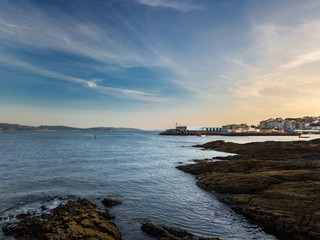 Cliffs and small lighthouse in Pontevedra, Spain