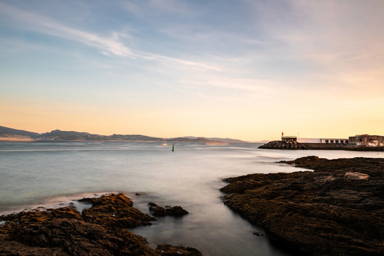 Cliffs and small lighthouse in Pontevedra, Spain