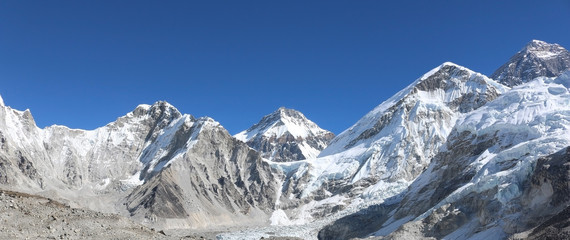 Amazing Shot Panoramic view of Nepalese Himalayas mountain peaks covered with white snow attract many climbers, some of them highly experienced mountaineers