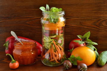 Healthy vegetable salad in a glass jar