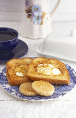 A Classic Meal Eggs Fried in the Center of Toast for Breakfast