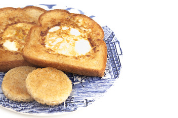 A Classic Meal Eggs Fried in the Center of Toast for Breakfast