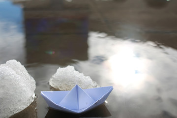 paper boat in a pool