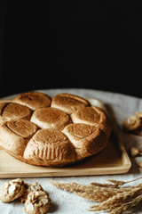 Freshly baked bread on wooden table