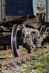 Fototapeta na wymiar Wheels of a freight railway car close-up. Russia