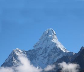 Naklejka na ściany i meble Amazing and Wonderful view of mountain Ama Dablam in the Mount Everest range, iconic peak of Everest trekking route, eastern Nepal