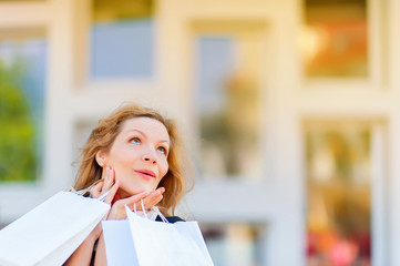 girl dreaming of buying closeup, shopping