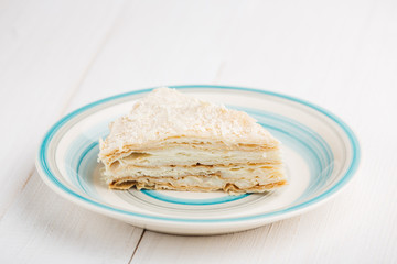 Slice of classic layered cake Napoleon