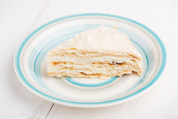 Slice of classic layered cake Napoleon