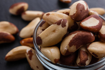 brazil nut on a dark stone background