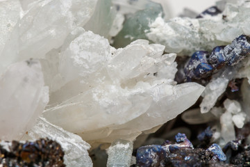Macro mineral stone Drusus quartz with sphalerite in the rock a white background