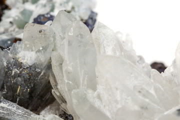 Macro mineral stone Drusus quartz with sphalerite in the rock a white background