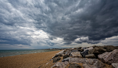 Dramatic black sky over Keyhaven bay, Hampshire, UK