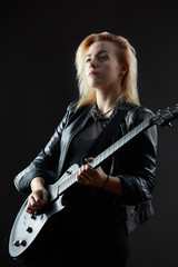 Blonde woman rocker guitarist black dark scene