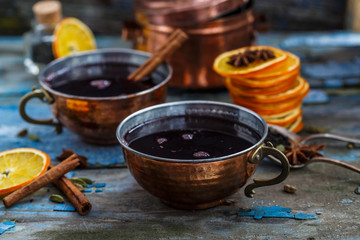 Mulled wine in copper cup close view
