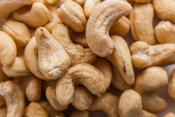 cashew nuts on a white acrylic background