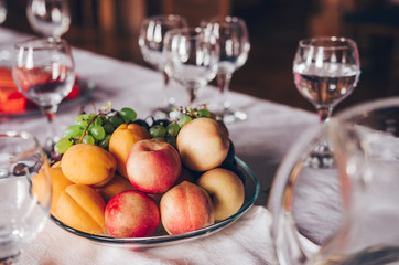 Serving fruits and drinks at event